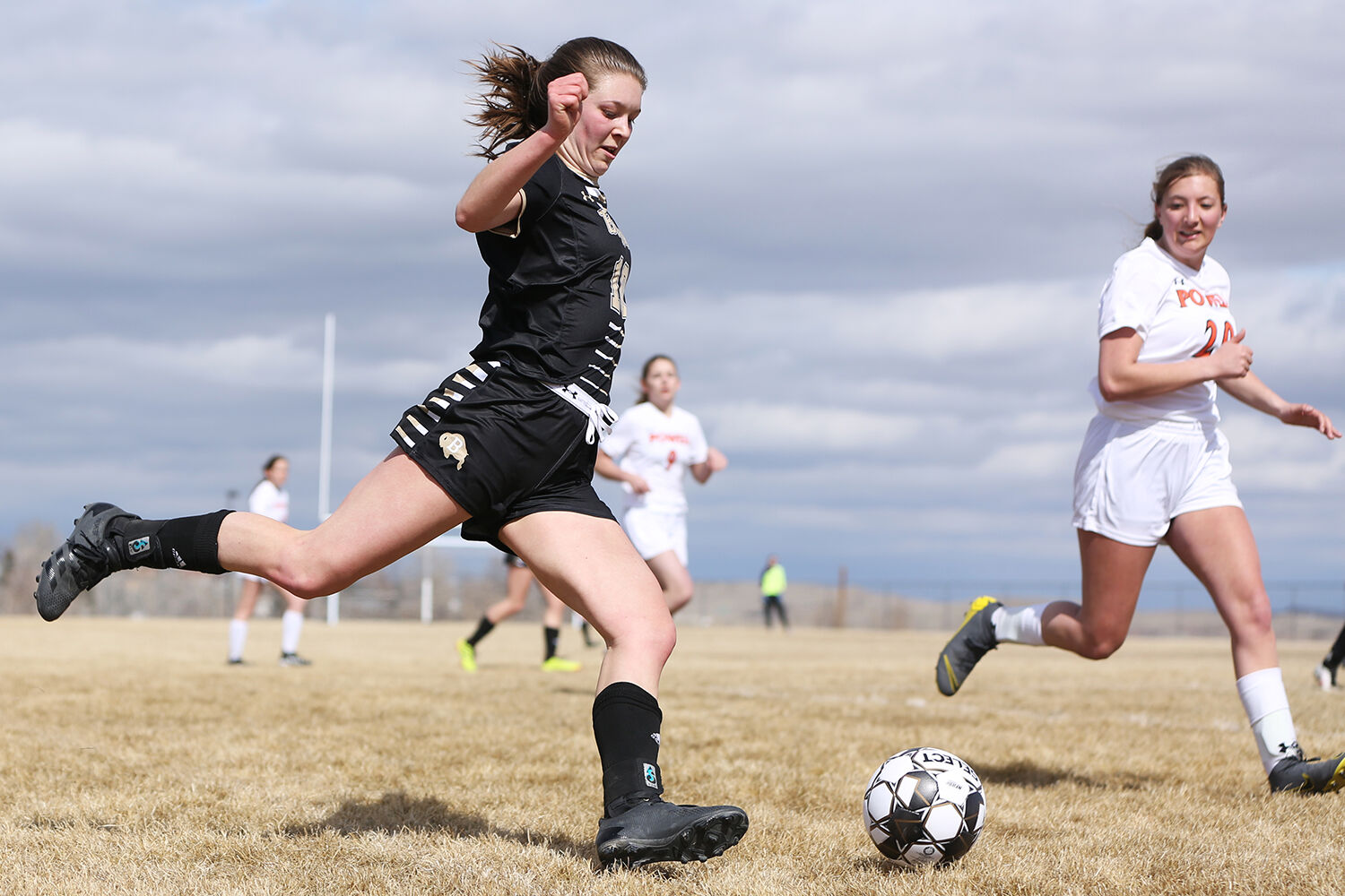 Vivi Ostheimer sets up to return the ball